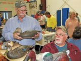 Ocracoke carvers David O'Neal and Scotty Robinson at the 2018 festival.